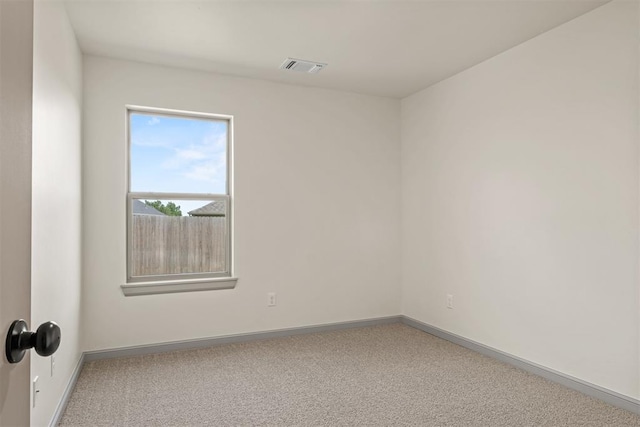 unfurnished room featuring carpet flooring