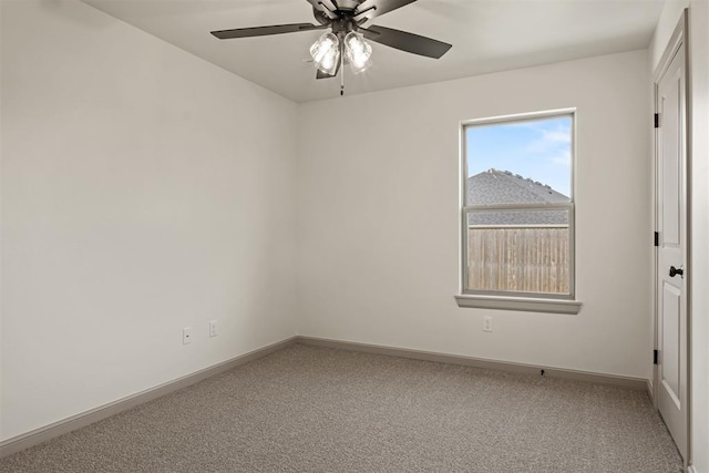 empty room featuring ceiling fan and carpet floors