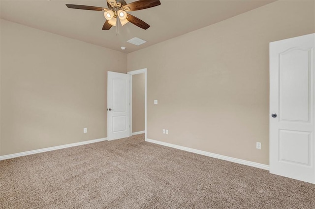 unfurnished room featuring ceiling fan and carpet floors