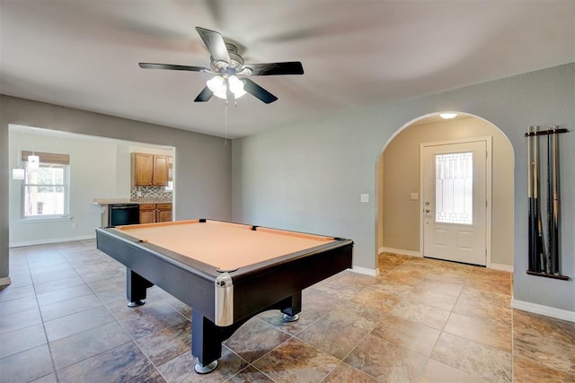 game room with ceiling fan and pool table