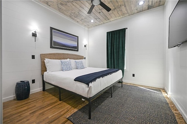 bedroom featuring ceiling fan, wood ceiling, and hardwood / wood-style flooring