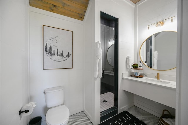 bathroom with wooden ceiling, tile patterned floors, sink, toilet, and walk in shower