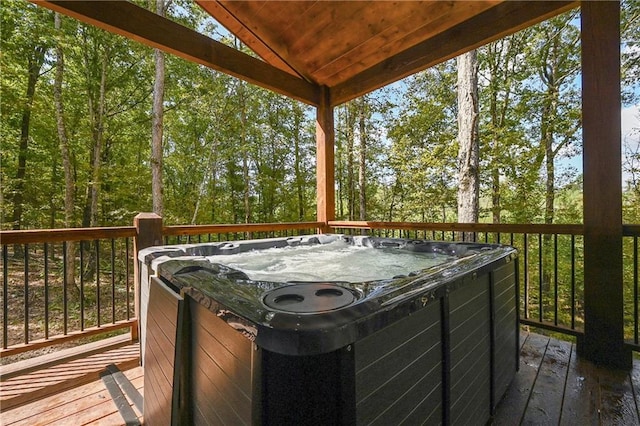 deck with a hot tub