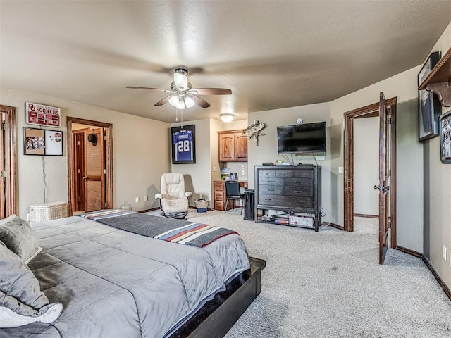 bedroom featuring light colored carpet and ceiling fan