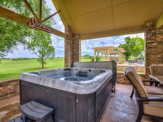 view of patio with a hot tub