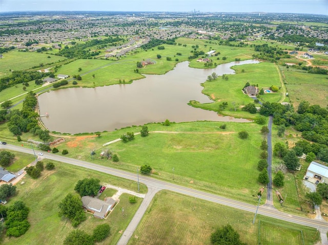 bird's eye view featuring a rural view and a water view