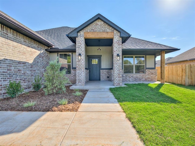 view of front of home with a front yard