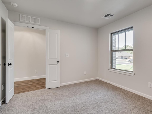 unfurnished bedroom featuring carpet floors