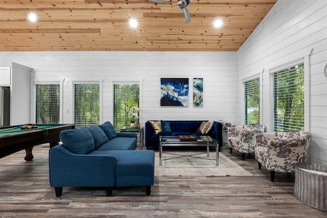 playroom featuring plenty of natural light, dark hardwood / wood-style flooring, vaulted ceiling, and wood ceiling