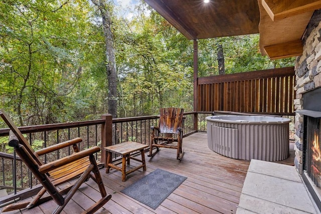 deck with a hot tub