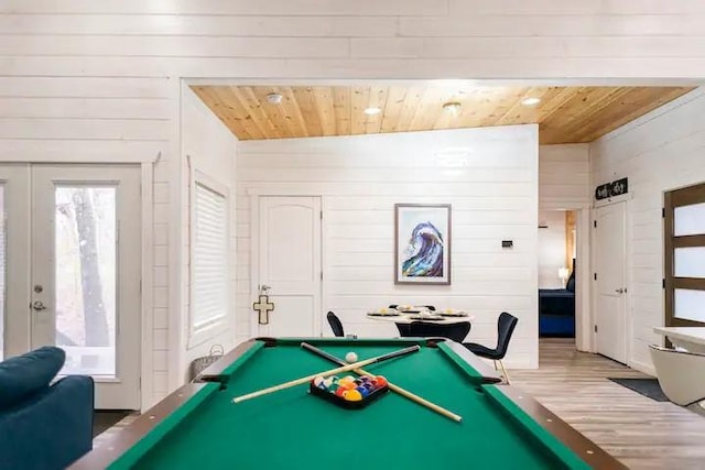 playroom featuring pool table, wood ceiling, french doors, and hardwood / wood-style floors