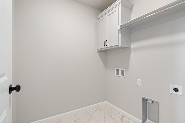 laundry area featuring washer hookup, electric dryer hookup, and cabinets