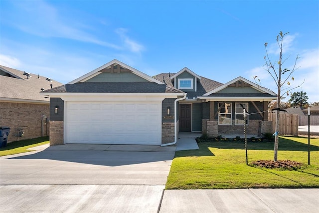 craftsman-style home with a garage and a front yard