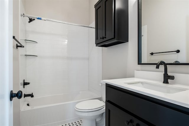 full bathroom featuring tile patterned floors, vanity, toilet, and tiled shower / bath combo