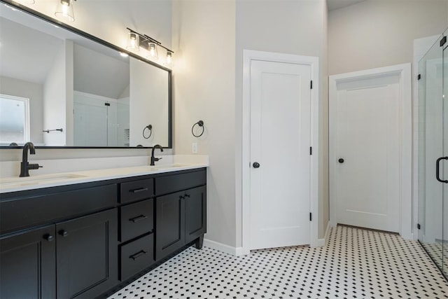 bathroom with vanity and walk in shower