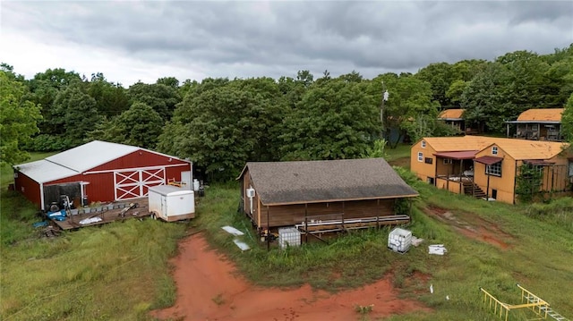 344586 E 860th Rd, Chandler, OK 74834 - aerial view of property and surrounding area featuring a heavily wooded area
