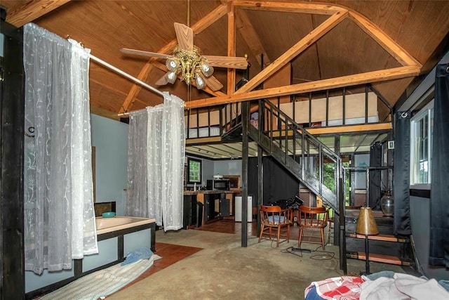 344586 E 860th Rd, Chandler, OK 74834 - misc room featuring ceiling fan, unfinished concrete floors, and stairs