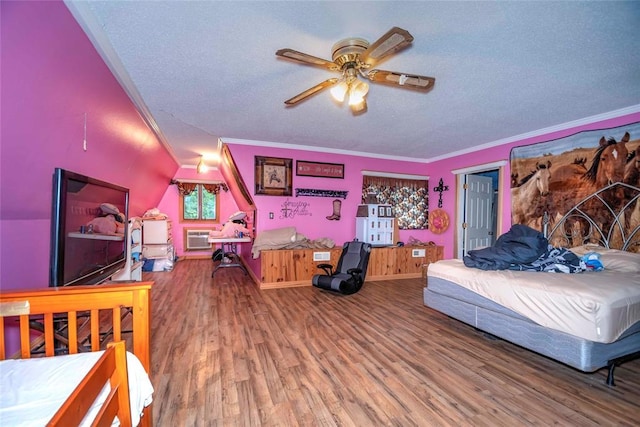 344586 E 860th Rd, Chandler, OK 74834 - bedroom featuring a textured ceiling, wood finished floors, crown molding, baseboards, and an AC wall unit