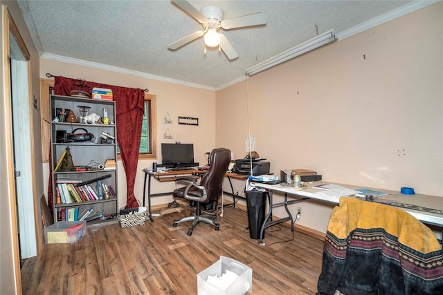 344586 E 860th Rd, Chandler, OK 74834 - office featuring wood finished floors, a ceiling fan, a textured ceiling, ornamental molding, and baseboards