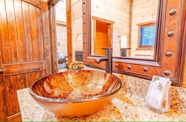 interior details with sink and wood walls