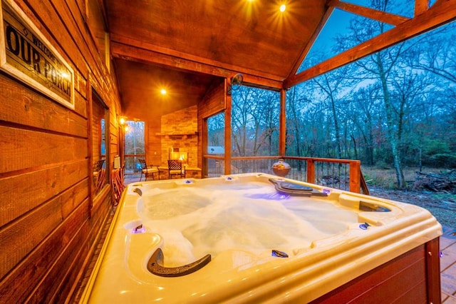 wooden deck featuring an indoor hot tub