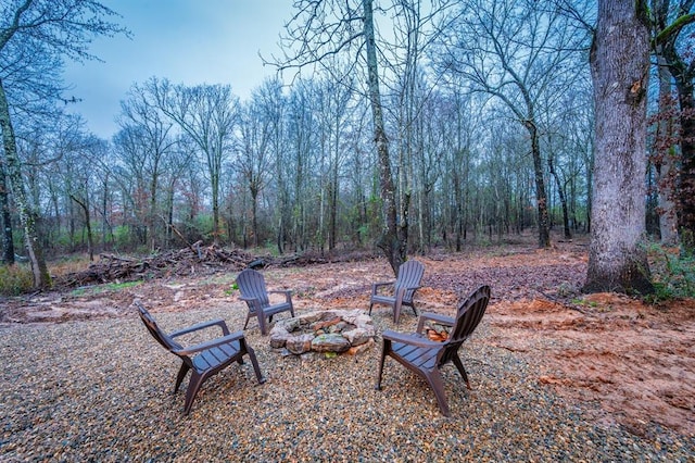 exterior space featuring an outdoor fire pit