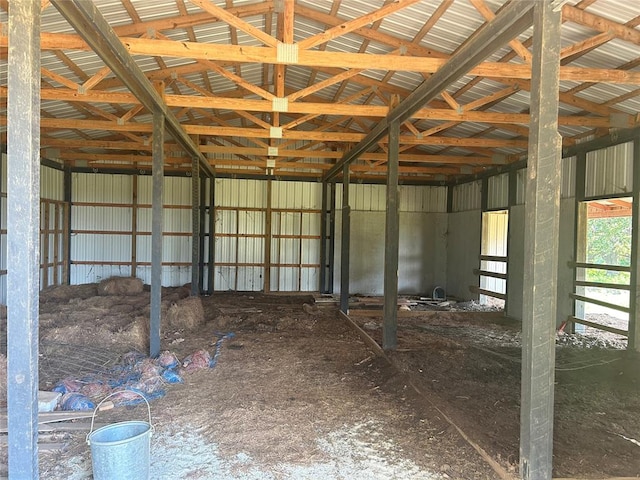 miscellaneous room with lofted ceiling