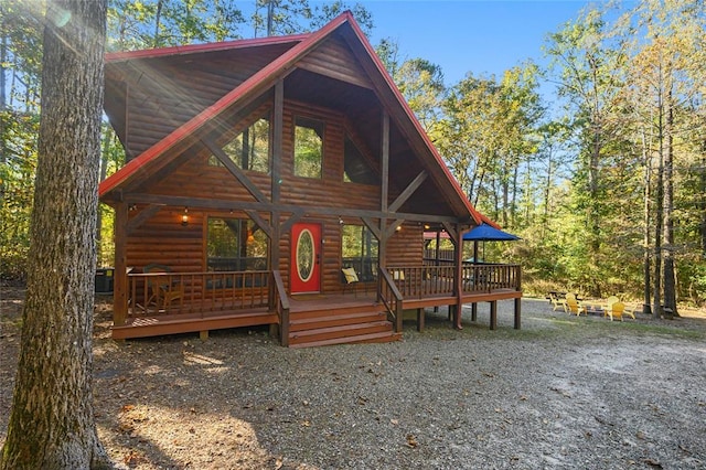 cabin featuring a deck