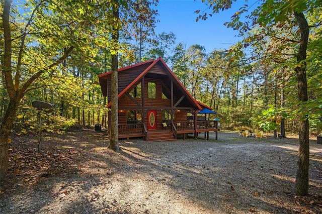 cabin featuring a wooden deck