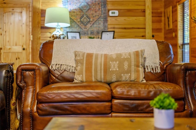 sitting room with wood walls