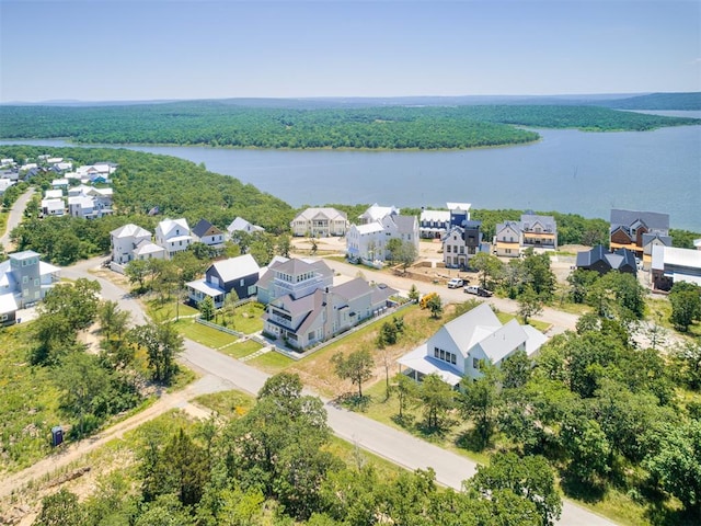 drone / aerial view with a water view