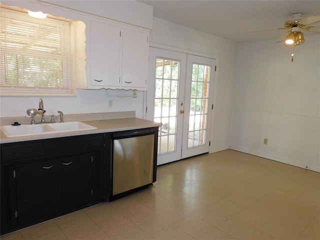 kitchen with dishwasher, french doors, sink, ceiling fan, and white cabinetry