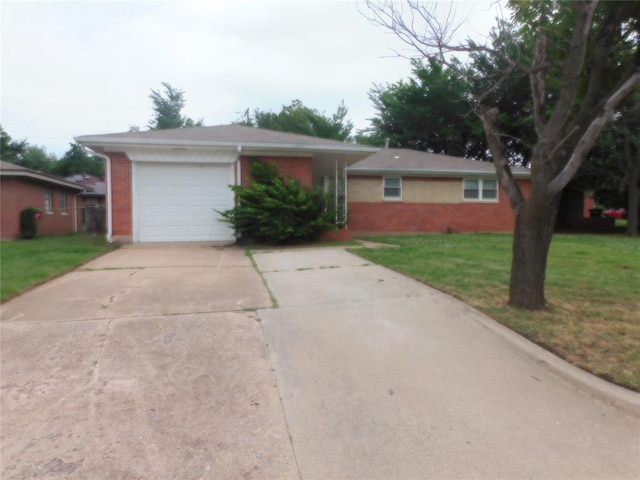 single story home featuring a front yard and a garage