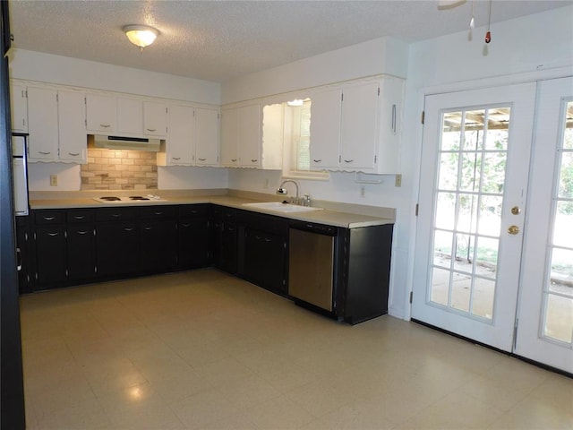 kitchen with white appliances, white cabinets, sink, a textured ceiling, and range hood