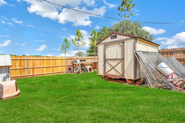 view of outdoor structure featuring a yard