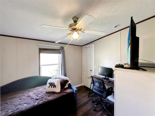 bedroom featuring ceiling fan, dark hardwood / wood-style floors, crown molding, and a textured ceiling