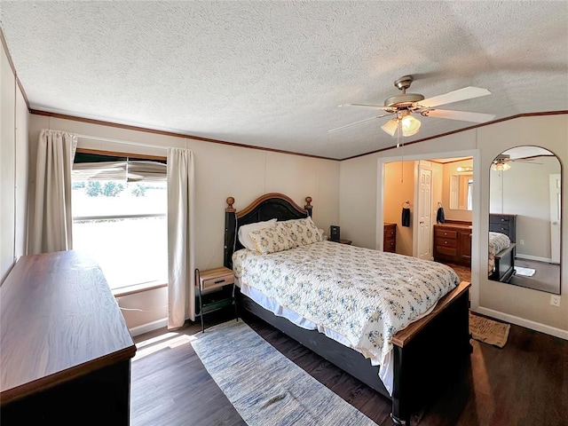 bedroom with a textured ceiling, ceiling fan, crown molding, and dark wood-type flooring