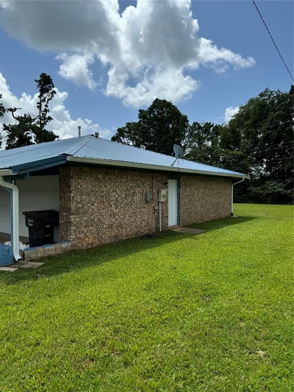 view of property exterior featuring a yard