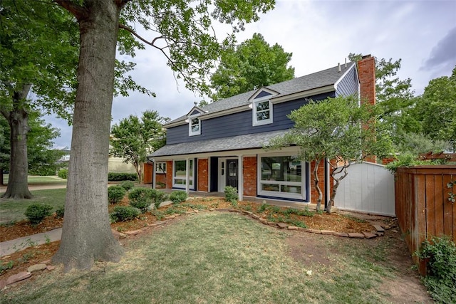 view of front of property with a front yard