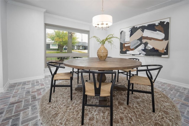 dining area featuring a notable chandelier and ornamental molding