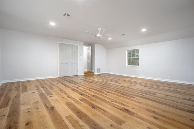 unfurnished room featuring ceiling fan and light hardwood / wood-style flooring