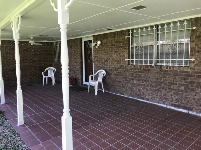 view of patio featuring a porch