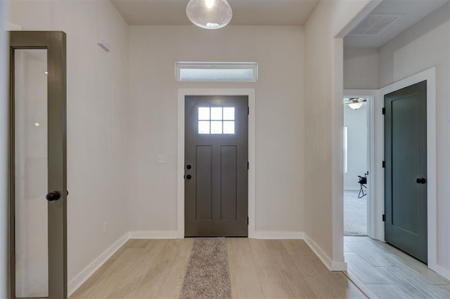 foyer entrance featuring light hardwood / wood-style floors