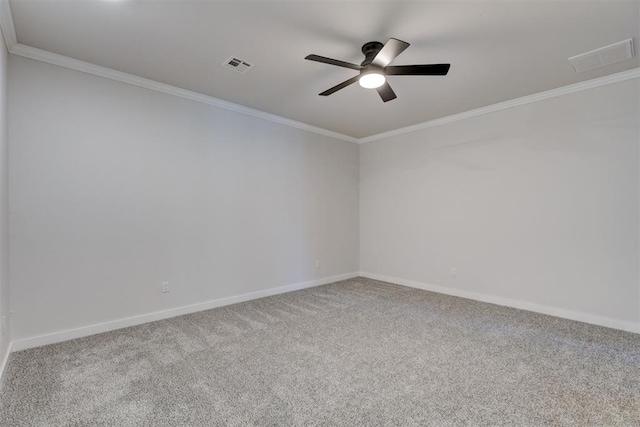 spare room with carpet, ceiling fan, and crown molding