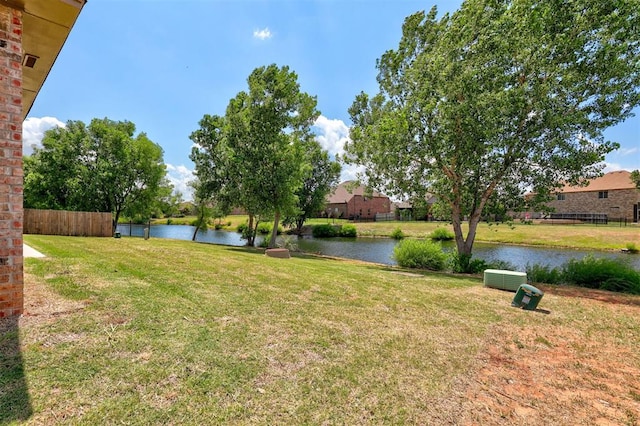 view of yard with a water view