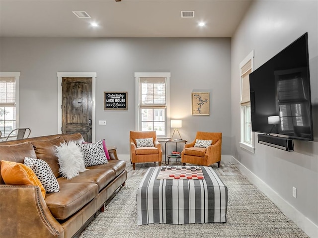 living room featuring a healthy amount of sunlight