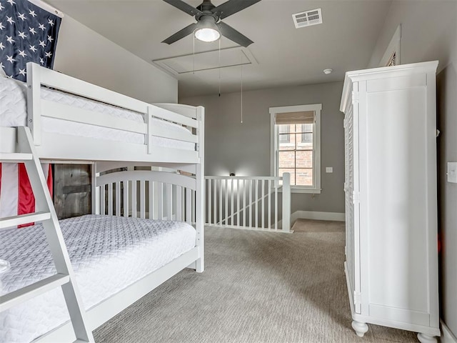 unfurnished bedroom featuring carpet floors and ceiling fan