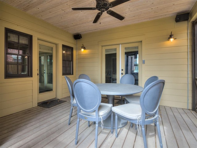 wooden terrace featuring ceiling fan