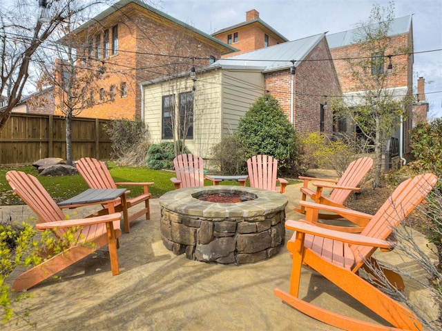 view of patio / terrace with a fire pit