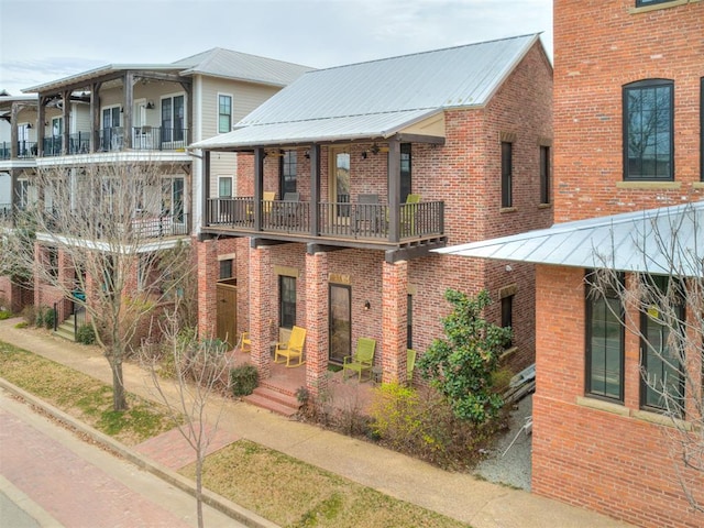 exterior space with a balcony